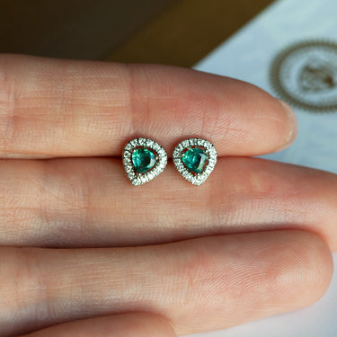 0.56ctw natural alexandrite 18k white gold stud earrings with diamond jackets, vintage-inspired, featuring color-changing gems.